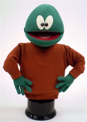 Green puppet with unusual eyes and bald head.