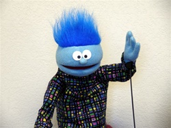 small blue boy puppet with blue hair
