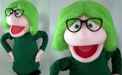 16" professional girl puppet with pink skin and green hair.