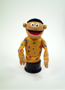13" professional puppet with honey skin and short black hair.  Boy child puppet.