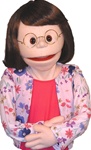 18" tall girl puppet with human wig and glasses and sparkling eyes.