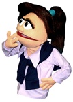 Josie is a female puppet with brown hair and a large pony tail.