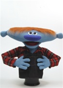 Elmer is a wide blue puppet who stands 20" tall.